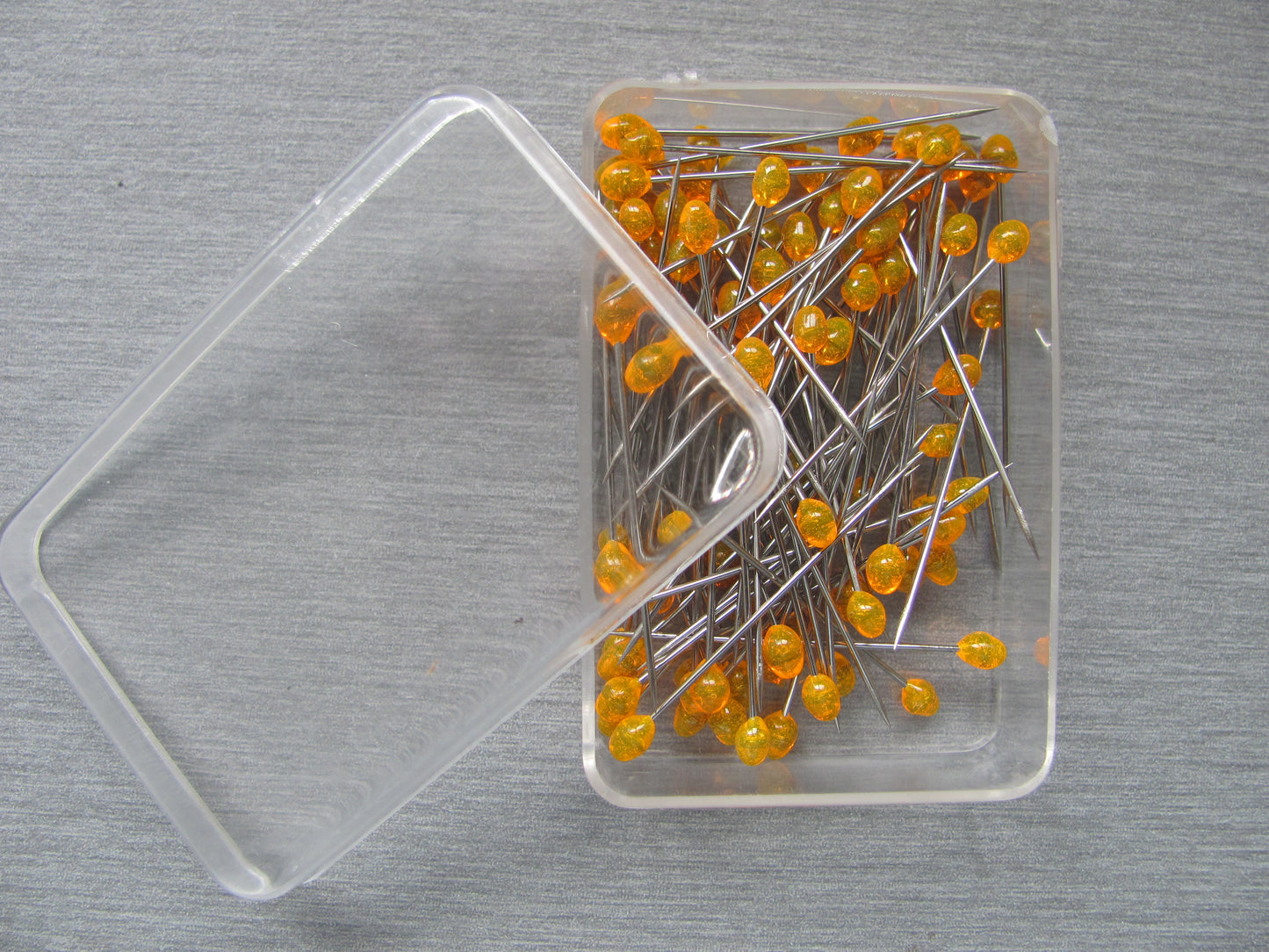 Stainless steel pins 0.59x33mm pearl light orange 100 pieces