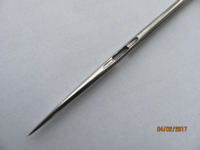 Mattress needle double-pointed